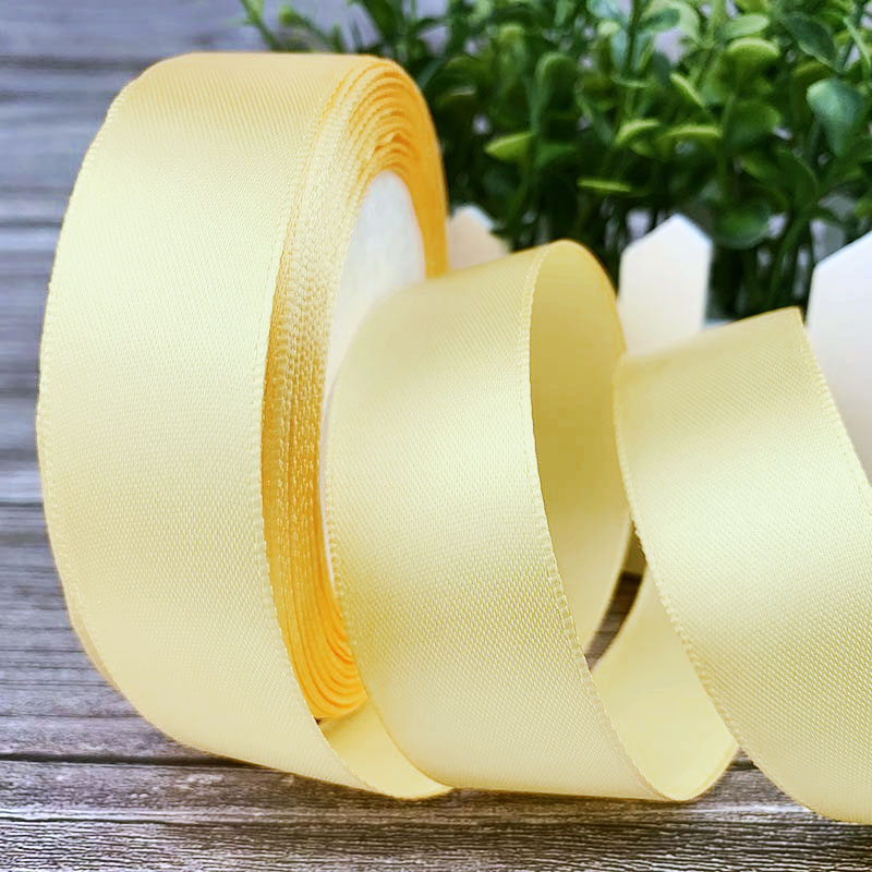 Лента атласная ширина 25мм Светло-жёлтая (25/002). Лавка кондитера - магазин для кондитеров и любителей сладкого творчества.
